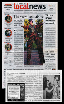 stilt walkers newspaper