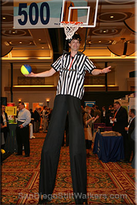 stilt walker basket ball