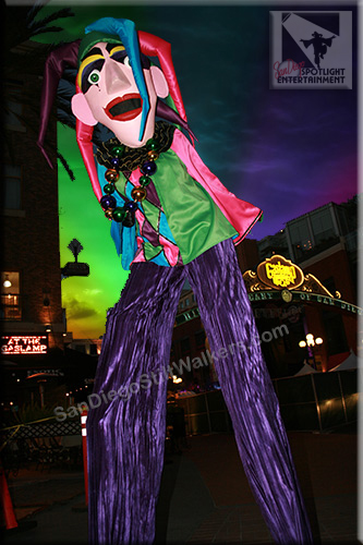 stilt walker mardi gras