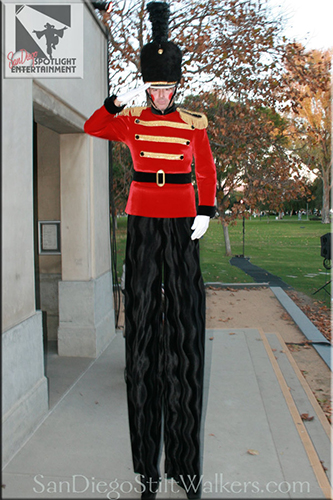 stilt walker toy soldier