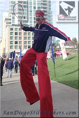 stilt walkers tennis guy
